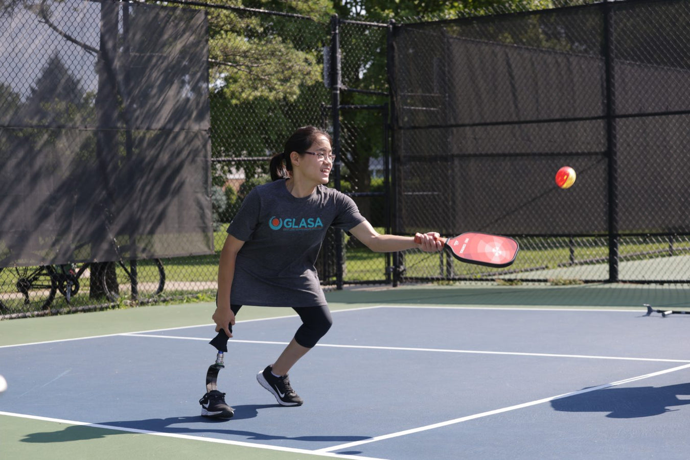 GLASA athlete getting ready to return a pickleball.