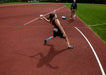 Athlete throwing a javelin from an elevated chair at the Great Lakes Games.