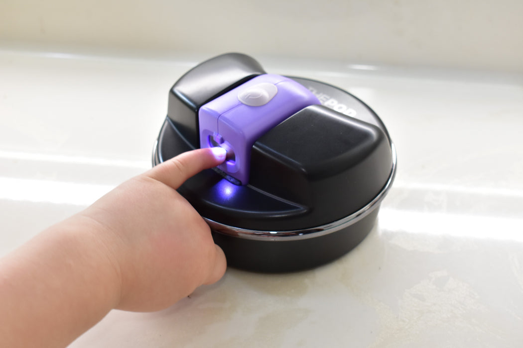 Infant using ClipDifferent POD adaptive nail clipper with parent