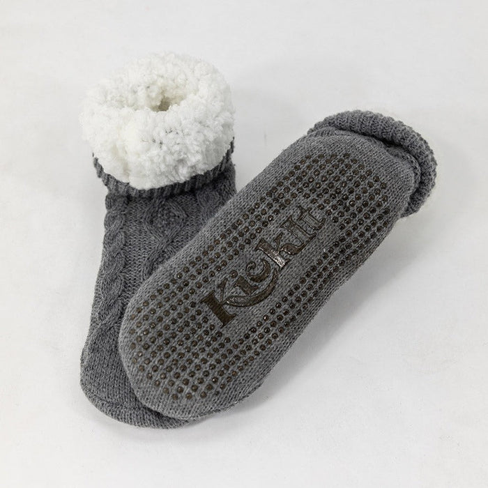 Detail of KickIt Hospital Slipper Socks soles on a white background