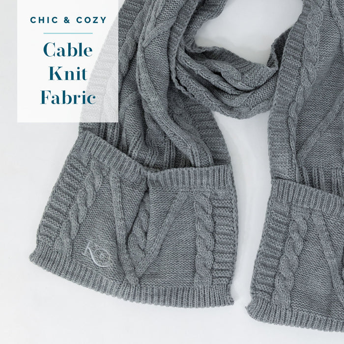 Detail of KickIt Infusion & Chemotherapy Knit Scarf with Pockets on a white background. Chic & cozy cable knit fabric
