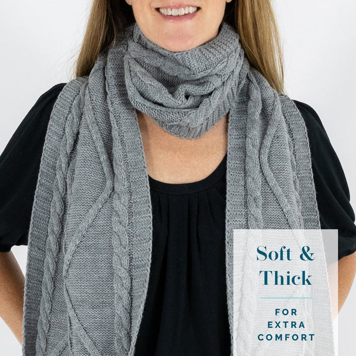 Detail of person wearing KickIt Infusion & Chemotherapy Knit Scarf with Pockets on a white background. Soft & thick for extra comfort