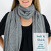Detail of person wearing KickIt Infusion & Chemotherapy Knit Scarf with Pockets on a white background. Soft & thick for extra comfort
