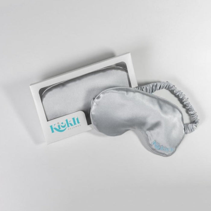 KickIt Kick Back Eye Mask with packaging on a white background