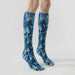 Lairos Blue Flutter Youth / Women's AFO Socks side worn on model on a white background