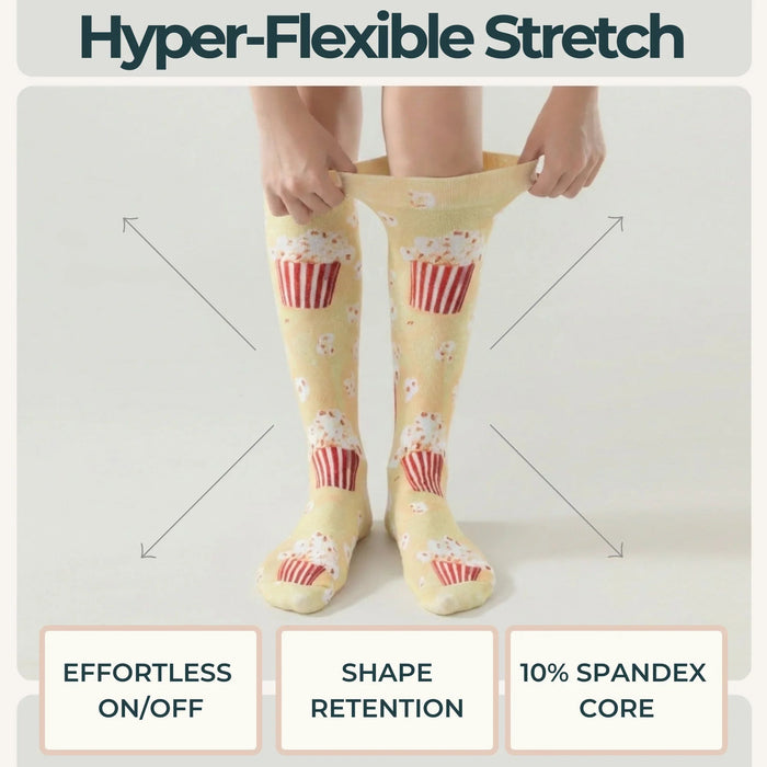 Lairos Cinema Pop Kids' AFO Socks worn on model as they stretch the collar on a white background. Text on image: Hyper-Flexible Stretch. Effortless On/Off. Shape Retention. 10% Spandex Core.