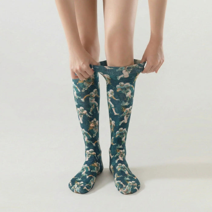 Lairos Game Force Youth / Women's AFO Socks worn on model as they stretch the collar on a white background