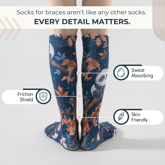 Lairos Moonlight Panda Toddler / Kids' AFO Socks back worn on model on a white background. Text on image: Socks for braces aren't like any other socks. Every detail matters. Sweat Absorbing. Friction Shield. Skin Friendly.