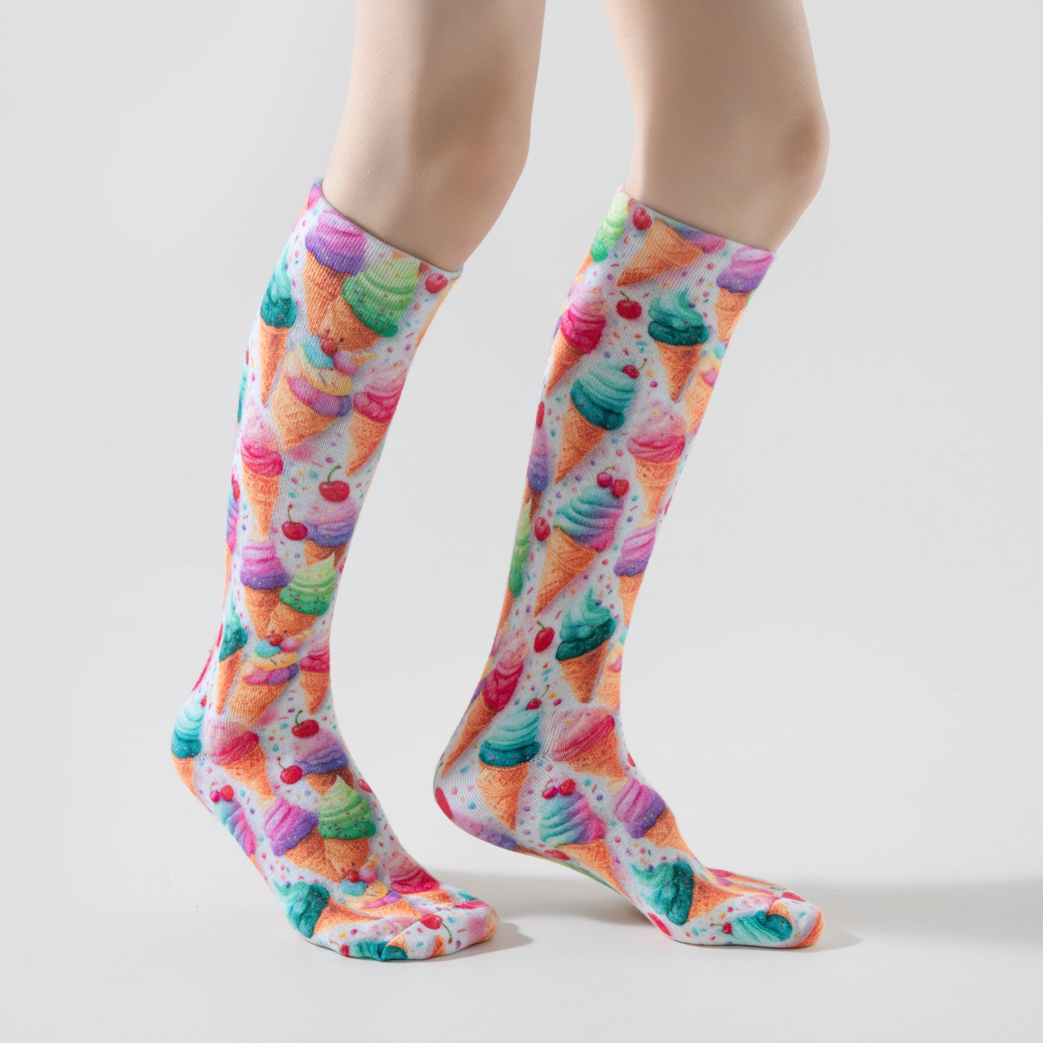 Lairos Pastel Swirls Kids' AFO Socks side worn on model on a white background