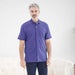 MagnaReady Blue Pique Knit Short Sleeve Polo with Magnetic Closures - lifestyle shot