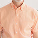 MagnaReady Short Sleeve Orange and White Gingham Cotton Shirt with Magnetic Closures - worn by man with adaptive needs