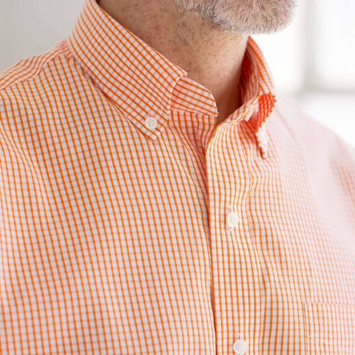 MagnaReady Short Sleeve Orange and White Gingham Cotton Shirt with Magnetic Closures - worn by man with adaptive needs