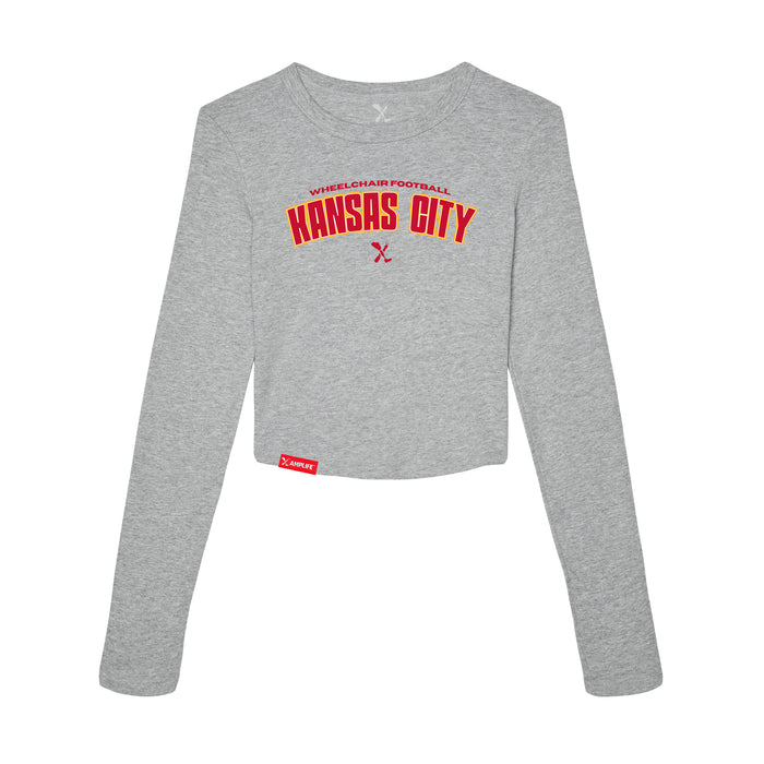MAS Kansas City Wheelchair Football Arch Women's Heather Grey Crop Long Sleeve T-Shirt on a white background