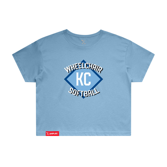 MAS Kansas City Wheelchair Softball Diamond Women's Carolina Blue Crop T-Shirt on a white background