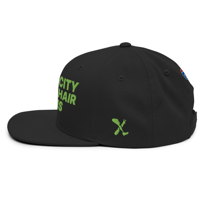 Left angle of the MAS Kansas City Advantage Wheelchair Tennis Black Flat Bill Snapback against a white background