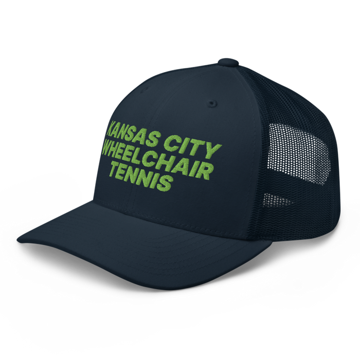 Front left angle of the MAS Kansas City Advantage Wheelchair Tennis Navy Curved Bill Trucker Snapback against a white background