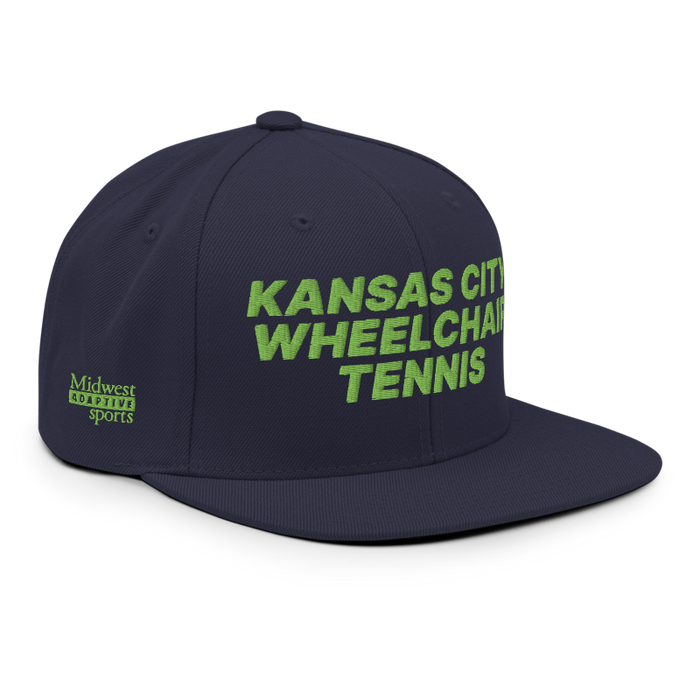 Front right angle of the MAS Kansas City Advantage Wheelchair Tennis Navy Flat Bill Snapback against a white background