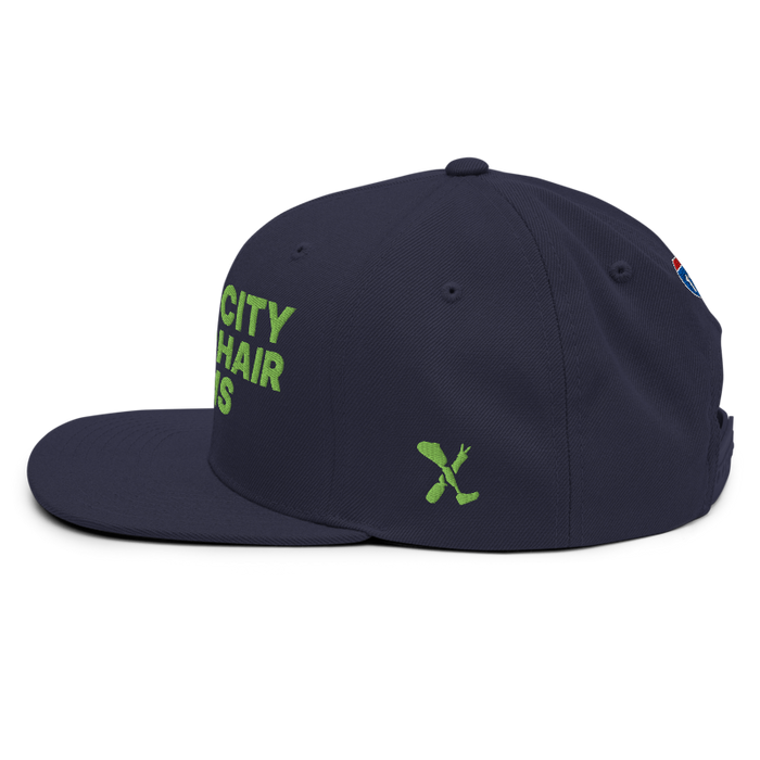 Left angle of the MAS Kansas City Advantage Wheelchair Tennis Navy Flat Bill Snapback against a white background