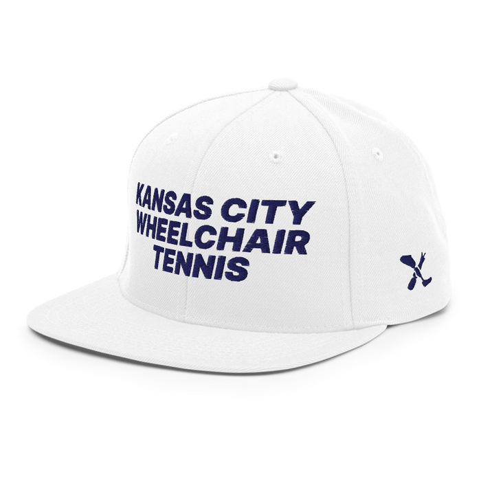 Front left angle of the MAS Kansas City Advantage Wheelchair Tennis White Flat Bill Snapback against a white background