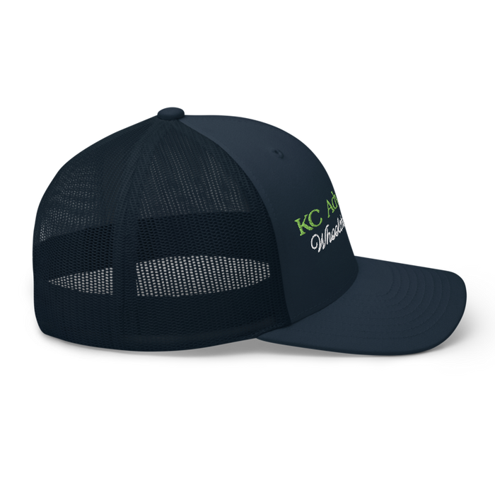 Right angle of the MAS Kansas City Advantage Wheelchair Tennis Script Navy Curved Bill Trucker Snapback against a white background