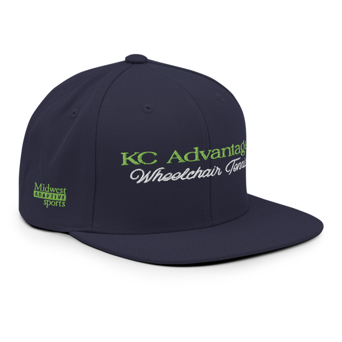 Front right angle of the MAS Kansas City Advantage Wheelchair Tennis Script Navy Flat Bill Snapback against a white background