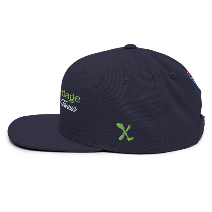Left angle of the MAS Kansas City Advantage Wheelchair Tennis Script Navy Flat Bill Snapback against a white background
