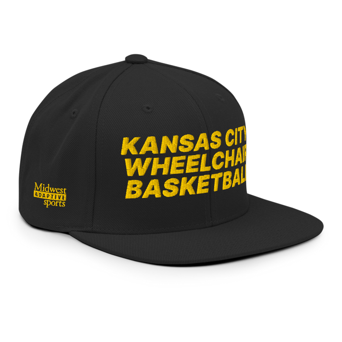 Front right angle of the MAS Kansas City Kings Wheelchair Basketball Black Flat Bill Snapback against a white background
