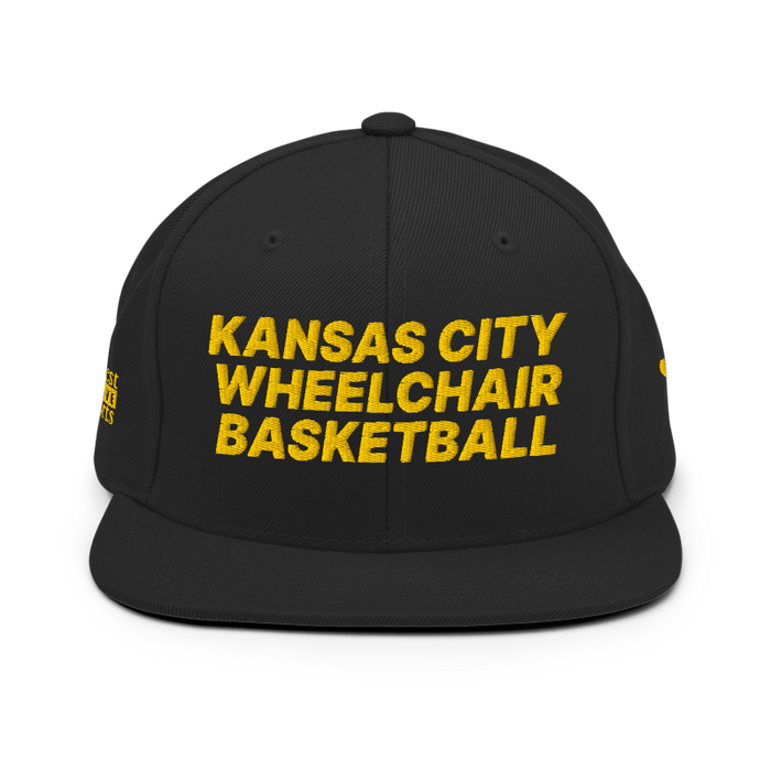 Front angle of the MAS Kansas City Kings Wheelchair Basketball Black Flat Bill Snapback against a white background