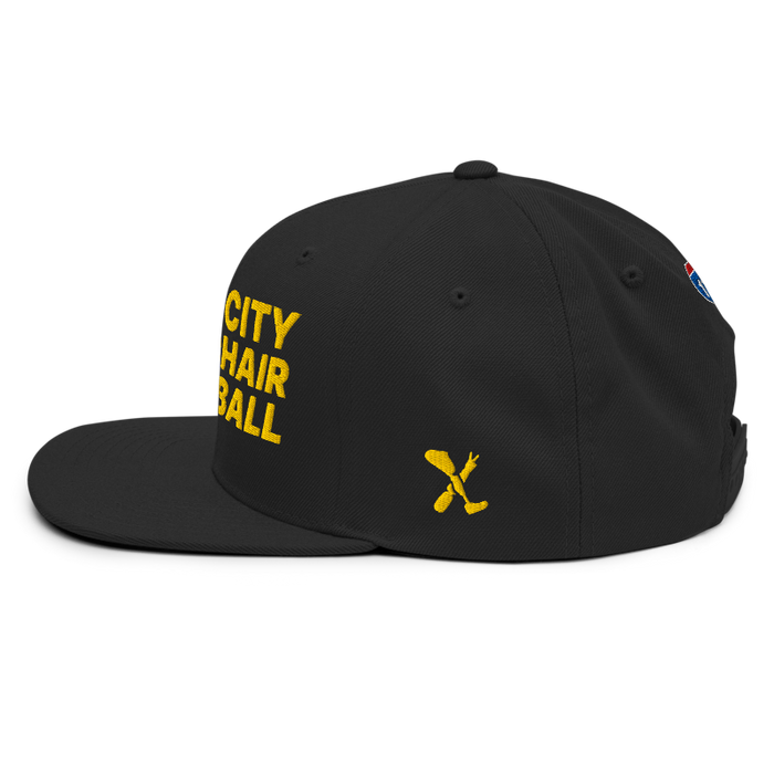 Left side angle of the MAS Kansas City Kings Wheelchair Basketball Black Flat Bill Snapback against a white background