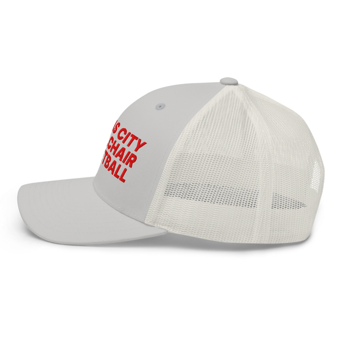 Left side angle of the MAS Kansas City Kings Wheelchair Basketball Silver Curved Bill Trucker Snapback against a white background