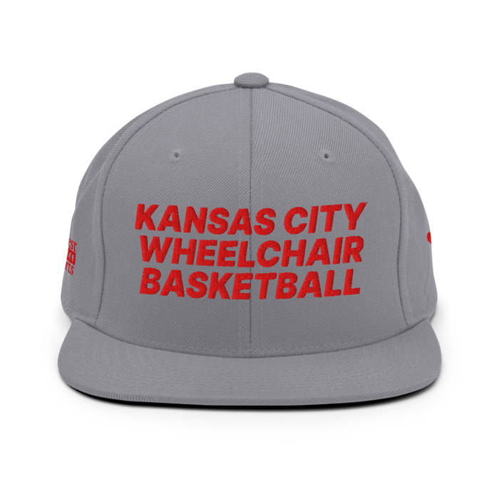 Front angle of the MAS Kansas City Kings Wheelchair Basketball Silver Flat Bill Snapback against a white background