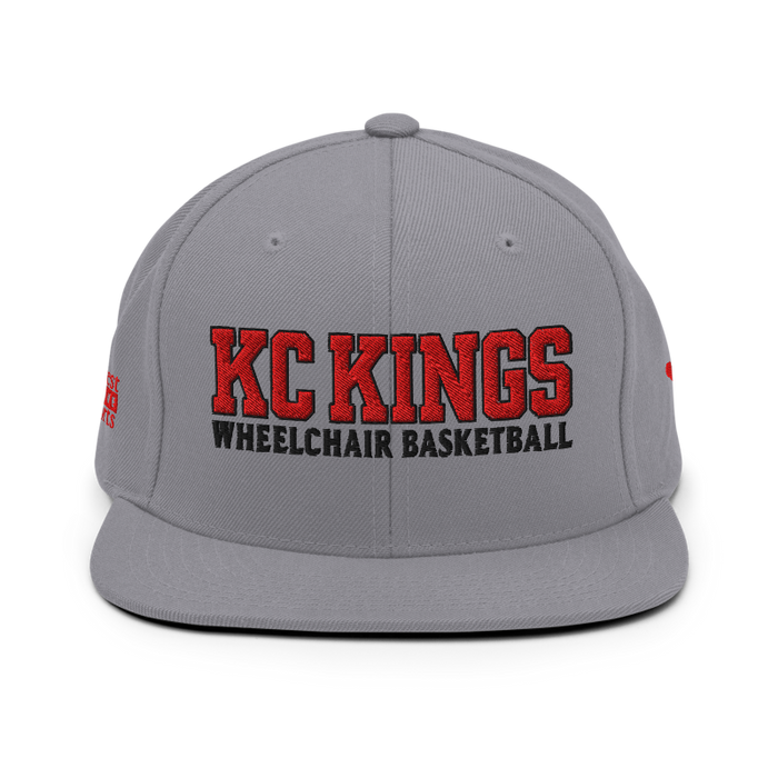 Front angle of the MAS Kansas City Kings Wheelchair Basketball KC Kings Silver Flat Bill Snapback against a white background