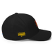 Right side angle of the MAS Kansas City Kings Wheelchair Basketball Lion Black Flexfit Curved Bill Fitted against a white background