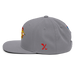Left side angle of the MAS Kansas City Kings Wheelchair Basketball Lion Silver Flat Bill Snapback against a white background