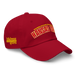 Front right angle of the MAS Kansas City Wheelchair Football Arch Cranberry Dad Hat against a white background