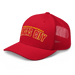 Front left angle of the MAS Kansas City Wheelchair Football Arch Red Curved Bill Trucker Snapback against a white background
