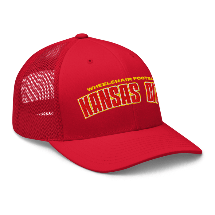 Front right angle of the MAS Kansas City Wheelchair Football Arch Red Curved Bill Trucker Snapback against a white background