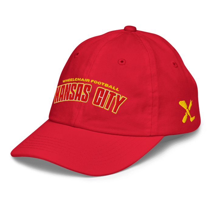 Front left angle of the MAS Kansas City Wheelchair Football Arch Youth Red Dad Hat against a white background