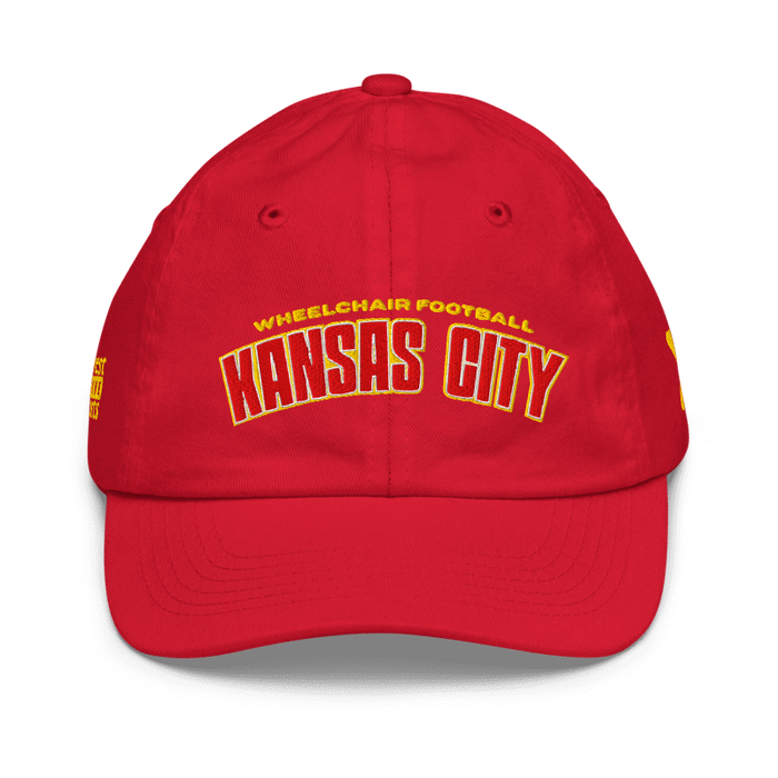Front angle of the MAS Kansas City Wheelchair Football Arch Youth Red Dad Hat against a white background