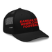 Front right angle of the MAS Kansas City Wheelchair Football Black & Red Curved Bill Trucker Snapback against a white background
