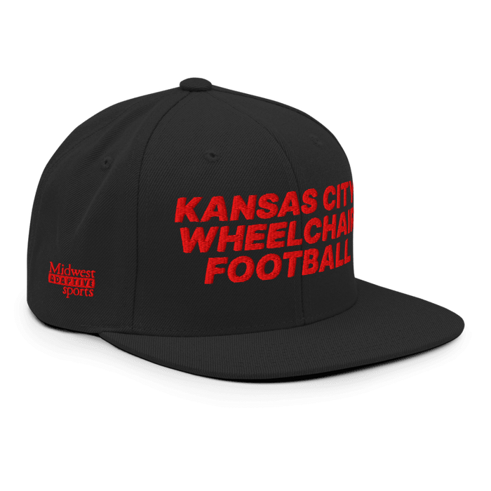 Front right angle of the MAS Kansas City Wheelchair Football Black & Red Flat Bill Snapback against a white background