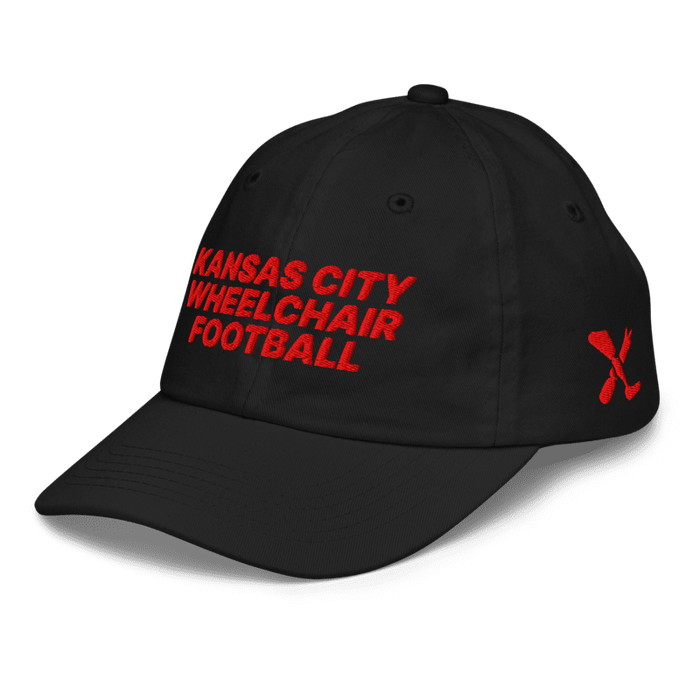 Front left angle of the MAS Kansas City Wheelchair Football Youth Black & Red Dad Hat against a white background