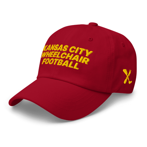 Front left angle of the MAS Kansas City Wheelchair Football Cranberry & Gold Dad Hat against a white background