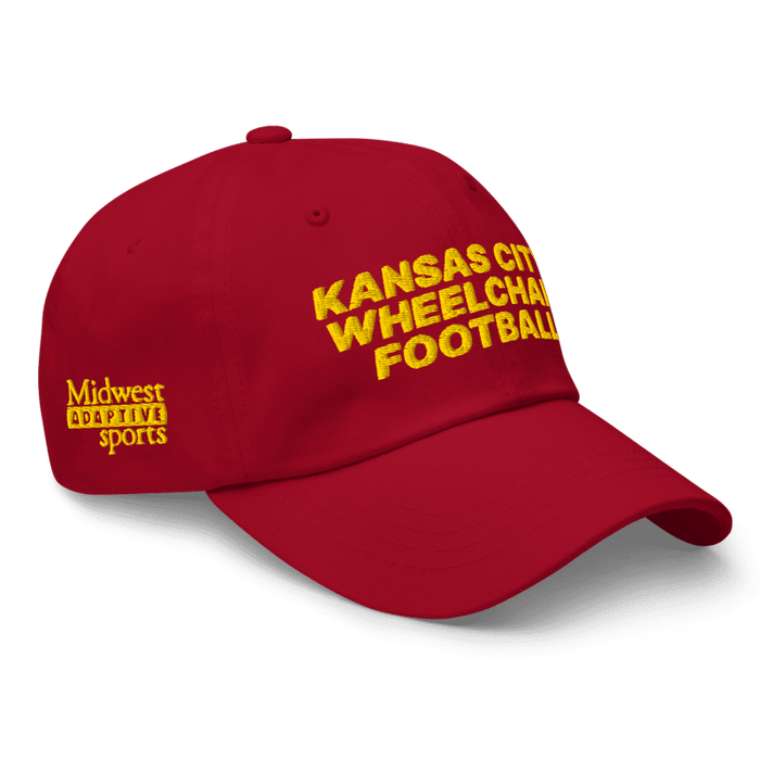 Front right angle of the MAS Kansas City Wheelchair Football Cranberry & Gold Dad Hat against a white background
