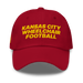Front angle of the MAS Kansas City Wheelchair Football Cranberry & Gold Dad Hat against a white background