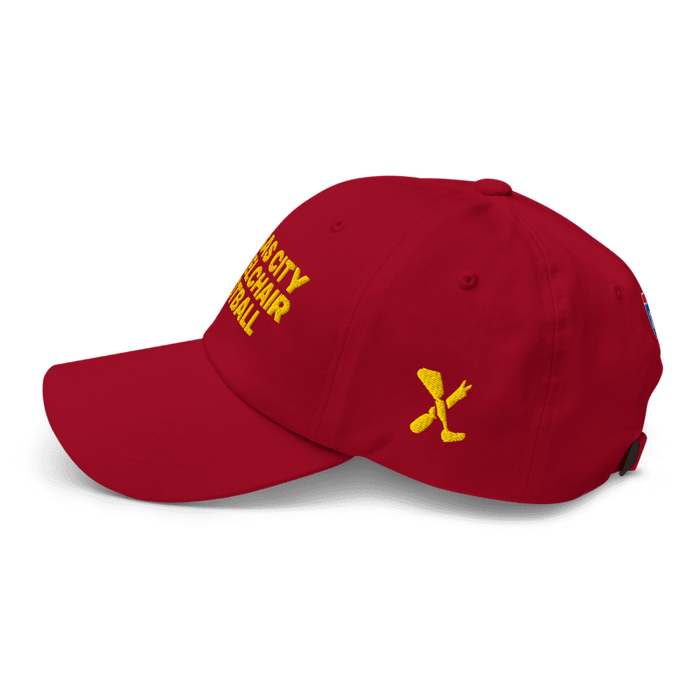 Left side angle of the MAS Kansas City Wheelchair Football Cranberry & Gold Dad Hat against a white background