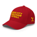 Front left angle of the MAS Kansas City Wheelchair Football Red & Gold Flexfit Curved Bill Fitted against a white background
