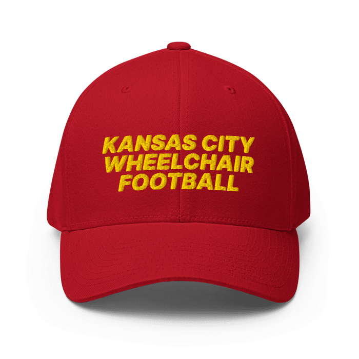 Front angle of the MAS Kansas City Wheelchair Football Red & Gold Flexfit Curved Bill Fitted against a white background