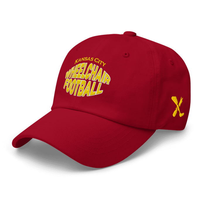 Front left angle of the MAS Kansas City Wheelchair Football Warp Cranberry & Gold Dad Hat against a white background