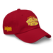 Front right angle of the MAS Kansas City Wheelchair Football Warp Cranberry & Gold Dad Hat against a white background